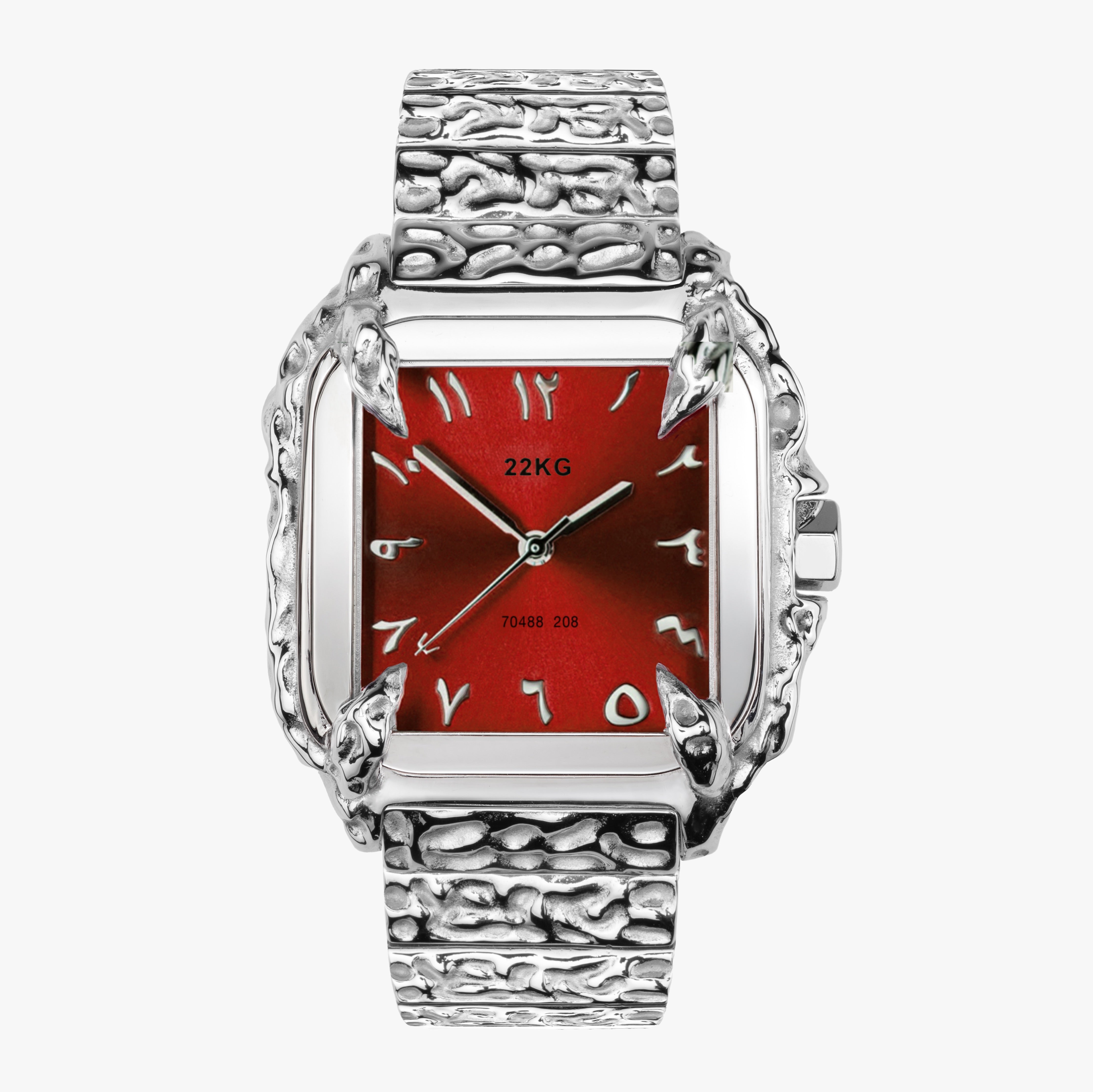 Silver 22KG CANINE watch with a red face  arabic on a white background